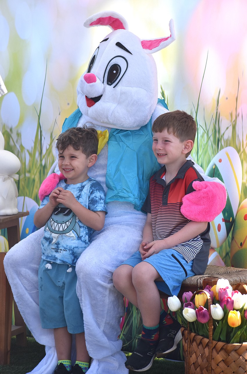 Dean Tumbush, 3, and Walker Tumbush, 6, are visiting the Easter Bunny all the way from Ohio.