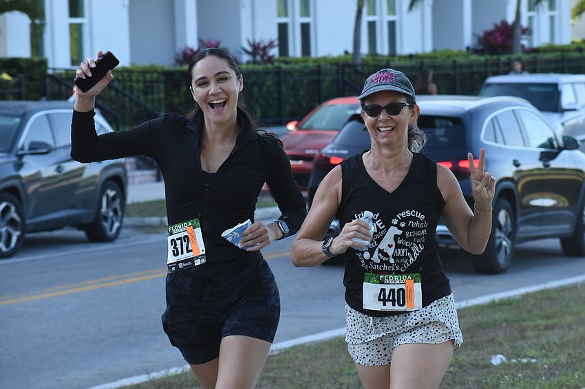 Raven Peters and Kim Livengood make the rounds on the course.
