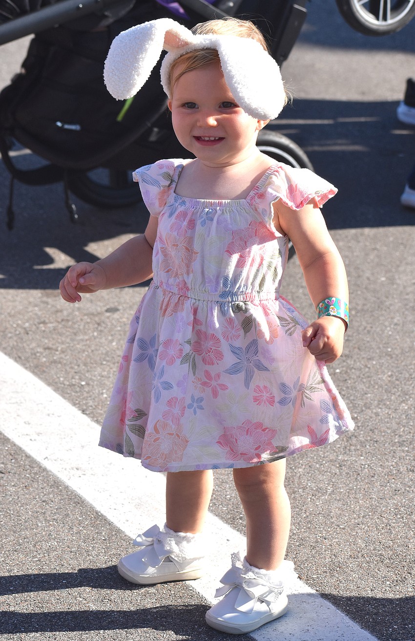 Lakewood Ranch's Madelyn Goldstein, 1, is eagerly waiting to meet the Easter Bunny at Eggstravaganza.