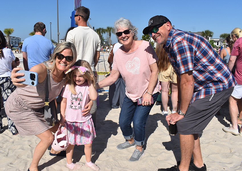 Lakewood Ranch's Christa Haedtke, 5-year-old River Haedtke, Janice Large and Dan Haedtke capture the moment at Eggstravaganza.
