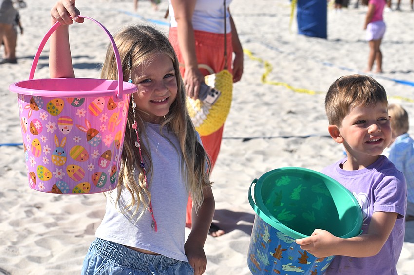 Waterside's Lucy Pellegrino, 6, and Dylan Pellegrino, 4, show off their Easter baskets at Eggstravaganza.