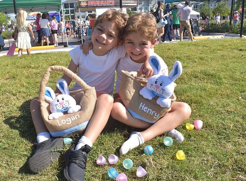 Greenbrook 5-year-old twins Logan and Henry Smith are ready to eat the candy they collected at Eggstravaganza March 28.