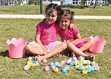 Lakewood Ranch sisters Jade Lowrey, 5, and Hazel Lowrey, 3, had fun collecting eggs and getting their faces painted at Eggstravaganza.