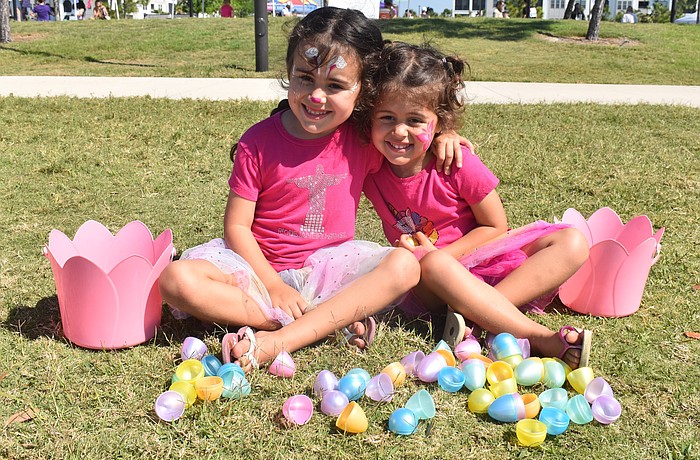 Lakewood Ranch sisters Jade Lowrey, 5, and Hazel Lowrey, 3, had fun collecting eggs and getting their faces painted at Eggstravaganza.