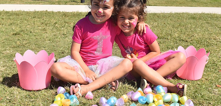 Lakewood Ranch sisters Jade Lowrey, 5, and Hazel Lowrey, 3, had fun collecting eggs and getting their faces painted at Eggstravaganza.
