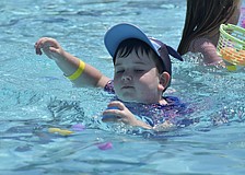 Roland Nyarfadi, 7, finds an egg.