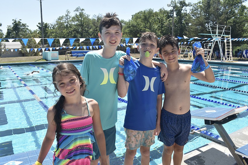 Valentinta Torrielli, 7, her brother Giovanni Torielli, 9, and Arlo Taylor, 10, and his brother Harold Taylor, 12, enjoyed participating in the Aqua Egg Hunt.