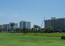 The southern end of Longboat Key feature many mid-rise condo buildings including the Beaches of Longboat Key (right, built in 1984), Regent Place of Longboat Key (middle two buildings, built in 1995) and Longboat Key Towers (left two buildings, built in 1970).
