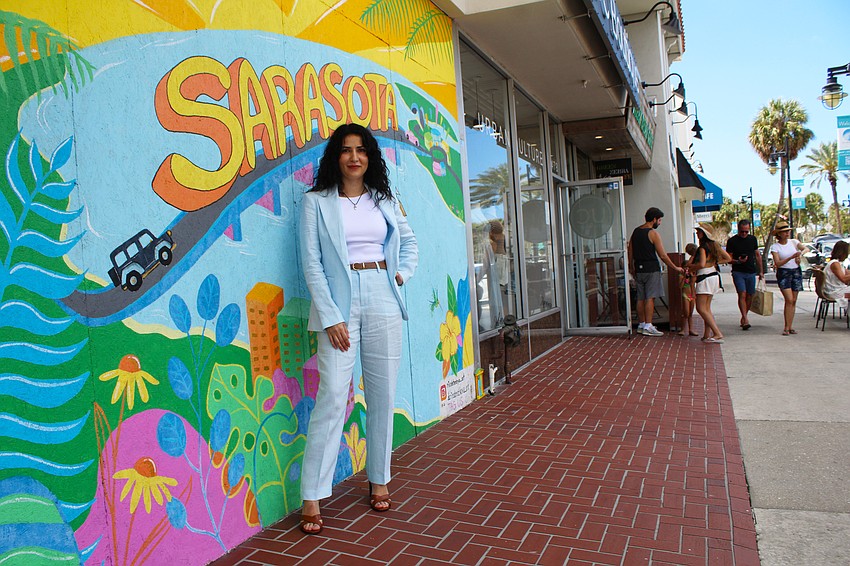 For many visitors to St. Armands Circle, the first art they see is the mural commissioned outside Art On St Armands Circle Sarasota, A Procaccini Gallery. Featured artist Darina Bratkova said she frequently sees people stopping to admire the work and snap a photo.