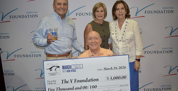 John Saputo (left), Denise Saputo (top center), Lorraine Vitale (right) and Dick Vitale (bottom center) at the "March Mayhem" fundraiser and Elite Eight watch party. The Saputos were the hosts March 28 at Gold Coast Eagle Distributing.