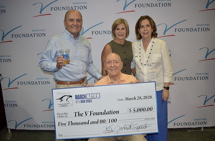 John Saputo (left), Denise Saputo (top center), Lorraine Vitale (right) and Dick Vitale (bottom center) at the "March Mayhem" fundraiser and Elite Eight watch party. The Saputos were the hosts March 28 at Gold Coast Eagle Distributing.