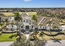A Country Club Village home at 7028 Portmarnock Place sold for $4.55 million. Built in 2003, it has five bedrooms, five-and-three-half baths, a pool and 7,072 square feet of living area.