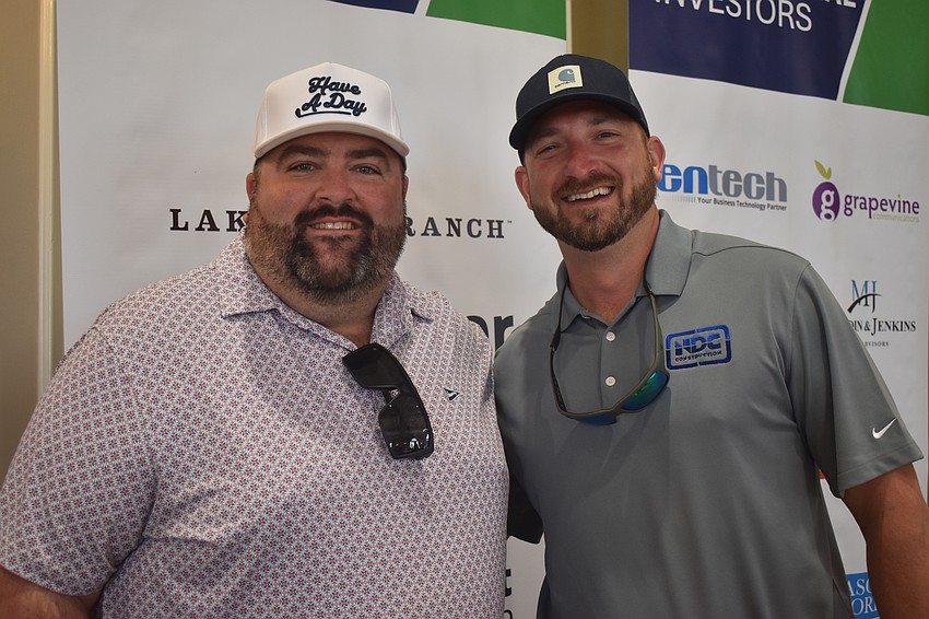 Chad Chaote, a business unit leader with Level Four Group, and Brando Fetzek, vice president of NDC Construction, prepare to golf in the Ranch Scramble put on by Lakewood Ranch Business Alliance.