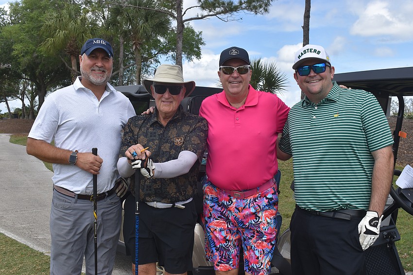 Scott Wilson, Ian Black, Nick DeVito and Dylan Devito with Ian Black Real Estate golf as a team for the Ranch Scramble on March 30.