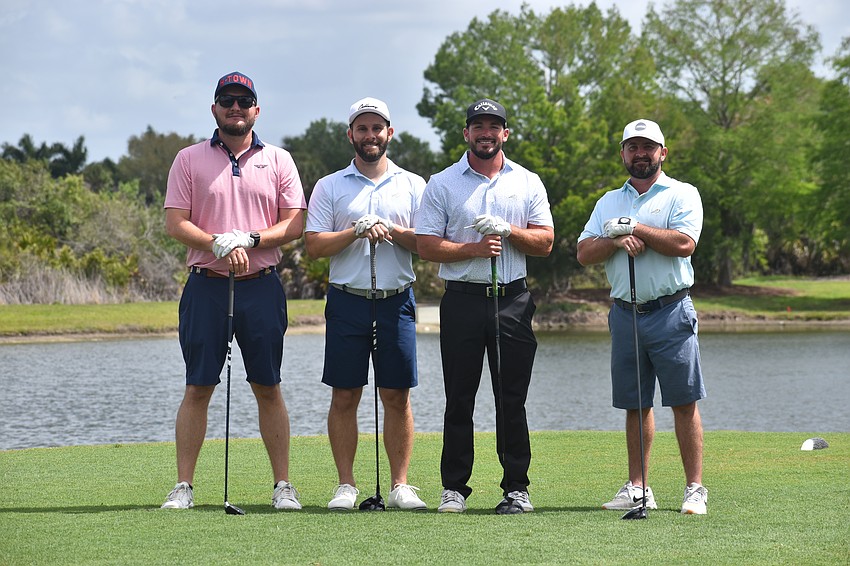 Connor Morse, Ryan Hedrick, Carlo Christiano and Dillon Norwick of Palm Printing participate in the Lakewood Ranch Community Activities Ranch Scramble.
