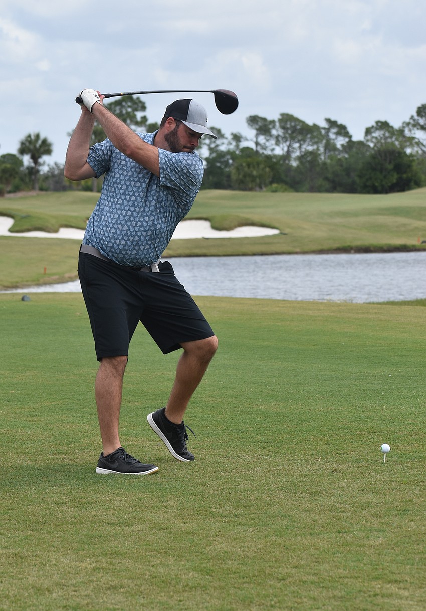 Justin Rickrode of Gallagher Afinity swings his club at the Lakewood Ranch Business Alliance Ranch Scramble on March 30.