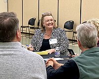 Karie Friling meets with Sarasota community members during the open house portion of the immersive two-day interview process with four other finalists for the city manager position.