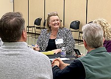 Karie Friling meets with Sarasota community members during the open house portion of the immersive two-day interview process with four other finalists for the city manager position.