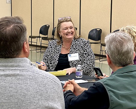 Karie Friling meets with Sarasota community members during the open house portion of the immersive two-day interview process with four other finalists for the city manager position.
