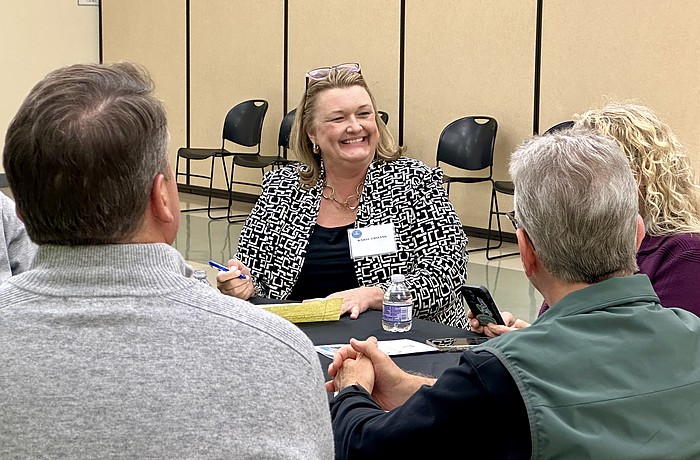 Karie Friling meets with Sarasota community members during the open house portion of the immersive two-day interview process with four other finalists for the city manager position.