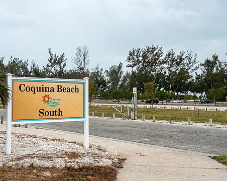 The Coquina Beach parking lot has dozens of free spots for beachgoers. There were plenty of open spaces Monday, March 30 as rain began to fall.
