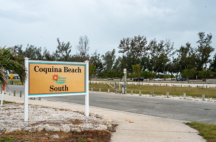 The Coquina Beach parking lot has dozens of free spots for beachgoers. There were plenty of open spaces Monday, March 30 as rain began to fall.