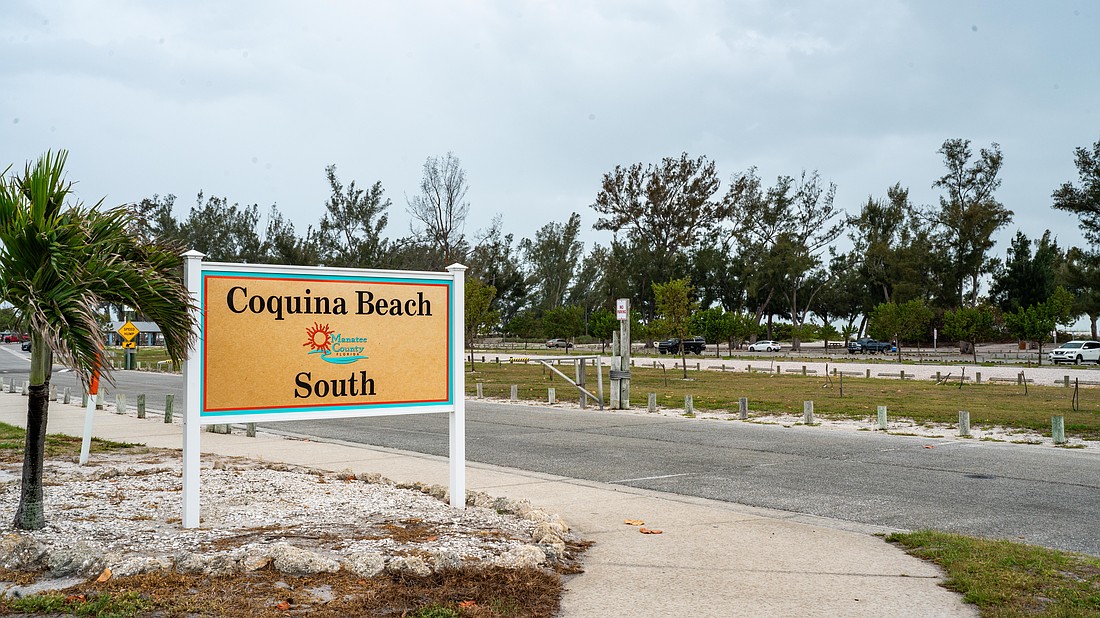 The Coquina Beach parking lot has dozens of free spots for beachgoers. There were plenty of open spaces Monday, March 30 as rain began to fall.