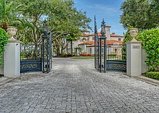 The home at 4423 Bay Shore Road was built in 1938 and has five bedrooms, five-and-five-half baths, a pool and 7,615 square feet of living area.