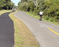 Sarasota County has opened a 1.5-mile stretch of newly bifurcated Legacy Trail, separating bicyclists and other wheeled conveyances from walkers and runners.