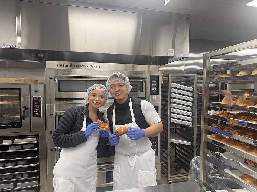 Stefani Go and Andy Yang, owners of the Tous Les Jours planned for the Baymeadows Village retail center, attended Tous Les Jours training school to learn how to prepare the cafe’s specialty baked goods. Stefani Go and Andy Yang, owners of the Tous Les Jours planned for the Baymeadows Village retail center, attended Tous Les Jours training school to learn how to prepare the cafe’s specialty baked goods.