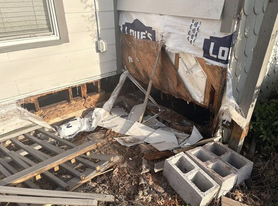 The yard of Matthew's Hope's Transitional Homes that was burned.