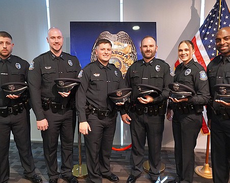 From left, Drew Ferguson, Jason Creasy, Noah Green, Benjamin Newman, Olivia Ledwith and Eric Coley are the newest sworn officers of the Sarasota Police Department.