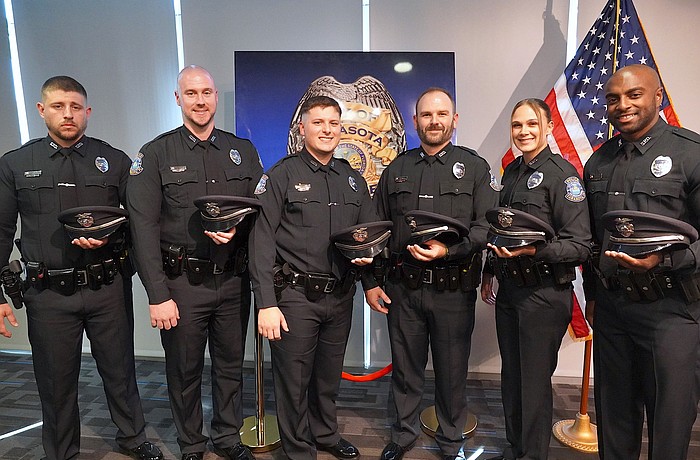 From left, Drew Ferguson, Jason Creasy, Noah Green, Benjamin Newman, Olivia Ledwith and Eric Coley are the newest sworn officers of the Sarasota Police Department.