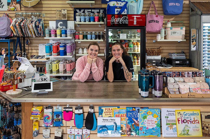 Hannah Garriott and Alicia Siracusa welcome shoppers to Fin Island Co., the CB’s Outfitters–owned boutique offering beachwear and island-inspired gifts on Siesta Key.