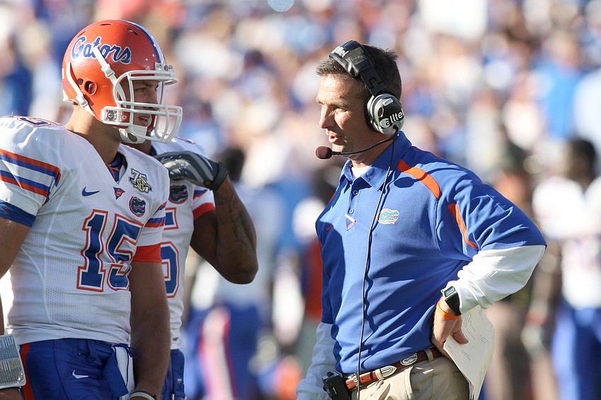 While at Florida, Urban Meyer helped the Gators claim the 2006 and 2008 BCS National Championships — and coached Heisman Trophy-winning quarterback Tim Tebow.