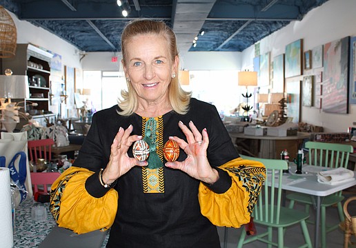 Pysanky expert Roksolana Tymiak-Lonchyna shows some examples of the traditional egg decoration patterns.