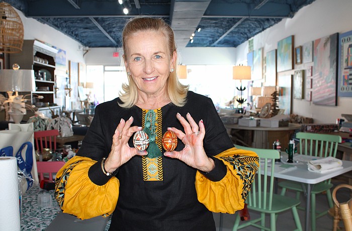 Pysanky expert Roksolana Tymiak-Lonchyna shows some examples of the traditional egg decoration patterns.