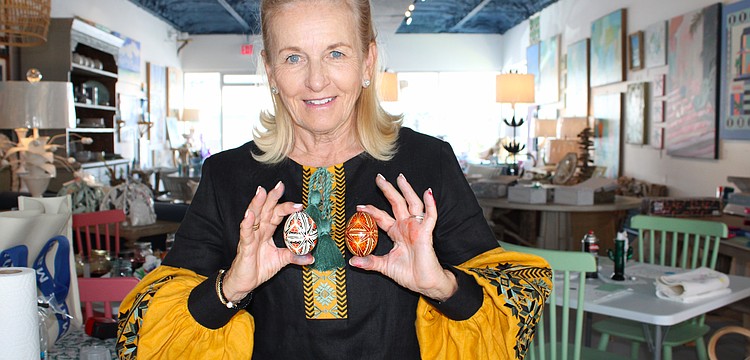 Pysanky expert Roksolana Tymiak-Lonchyna shows some examples of the traditional egg decoration patterns.