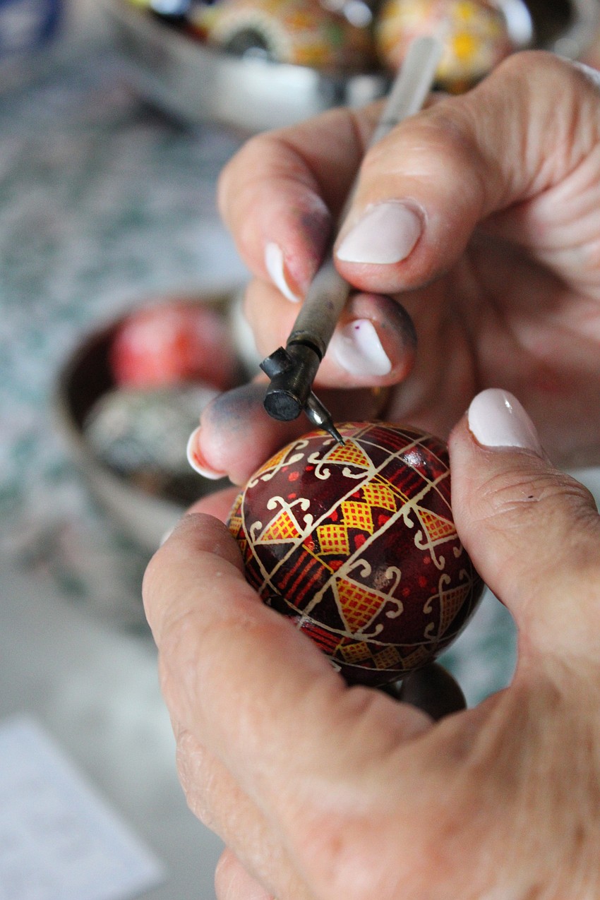 Roksolana Tymiak-Lonchyna shows how the smallest kistky can add intricate detail to the pysanky patterns.