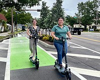Corinne Arriaga (left) has been promoted to the city's chief transportation planner and Alvimarie Corales to capital projects manager.