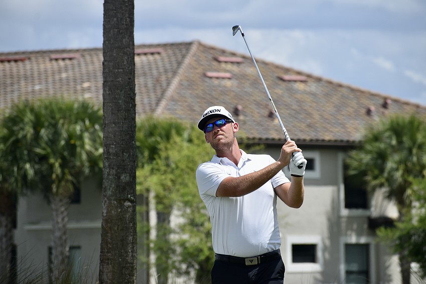 Ian Holt hits a drive on the 11th hole. Currently ranked No. 110 in the world, he was one over par through 12 holes before play was suspended.