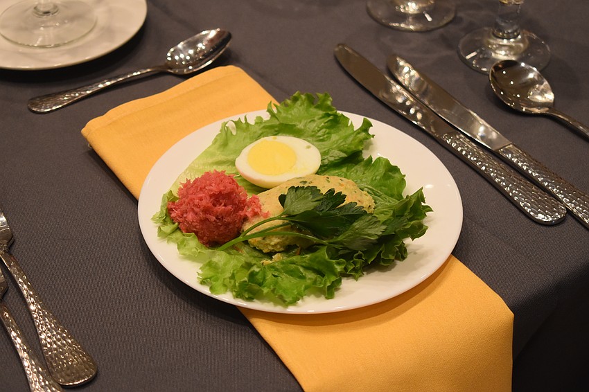A plate is set out for guests at the Seder meal.