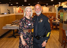 Kiwanis Club of Longboat Key President Danielle Gladding welcomes guest speaker Longboat Police Chief Russ Mager to update members about his approach to leadership since he assumed the role last autumn at the April 2 meeting.