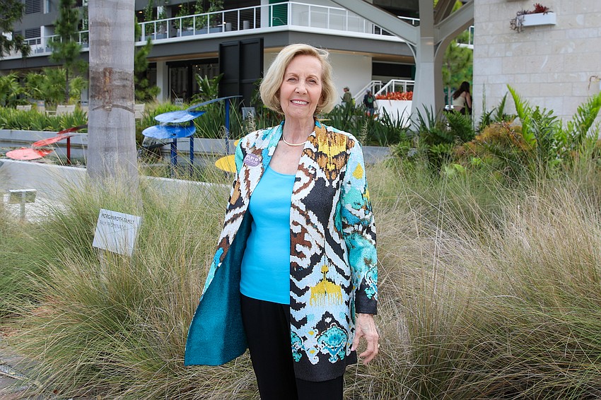 Sue Rosin makes her way through Selby Gardens to attend the Hope in Bloom event.