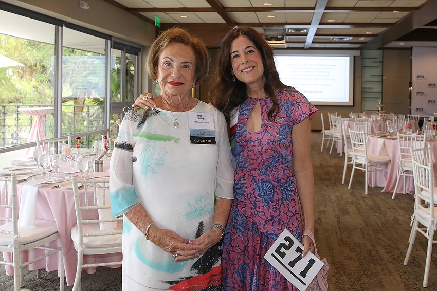 Hope in Bloom co-Chairs Marion Levine and Sasha Rosin are ready to greet their 230 guests at Marie Selby Botanical Gardens.