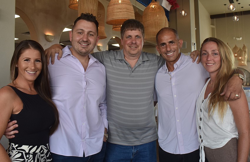 Lisa Atanassov, John Atanassov, Vinny Jurin, Joel King and Darcy King are glad to bring fresh food with no preservatives to University Town Center.