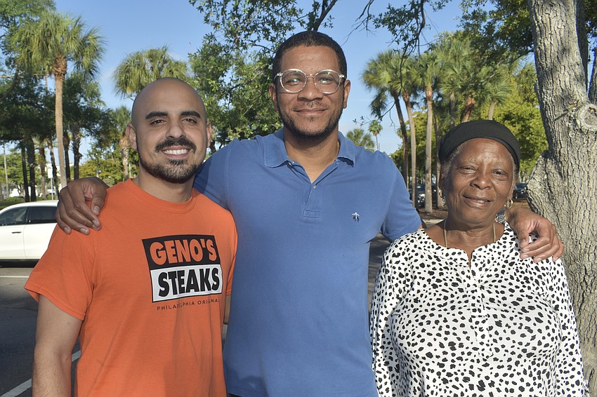 AJ Scheip, Jonathan Rameau and Gretha Rodriguez stand together after the walk.