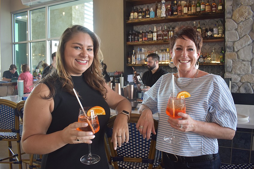 Lakewood Ranch’s Melissa Munker and Tara Barsch went to Blu Kouzina for drinks and appetizers. They are both drinking the Mediterranean-inspired cocktail Santorini Spritz.