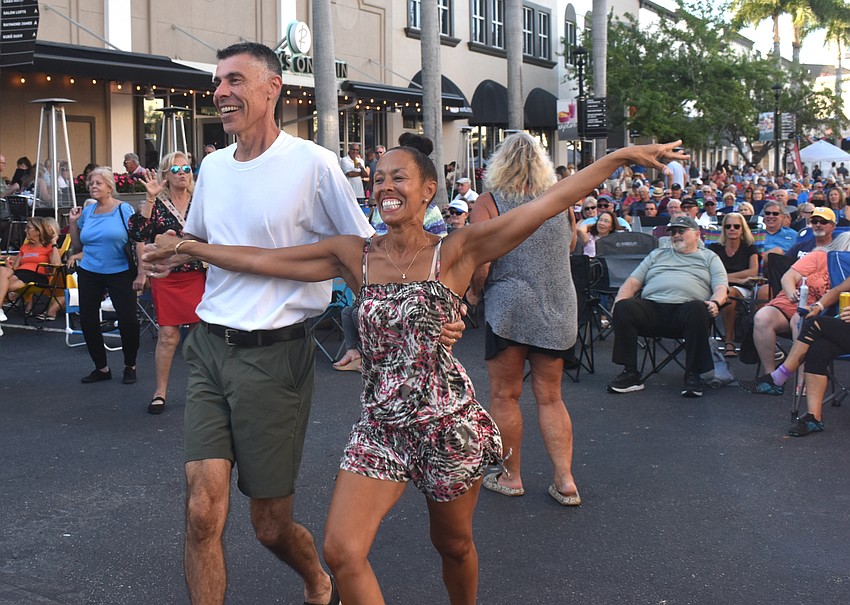 Lakewood Ranch's Daniel Saikaley and Johanne Gordon show off their dance moves at Music on Main April 3.