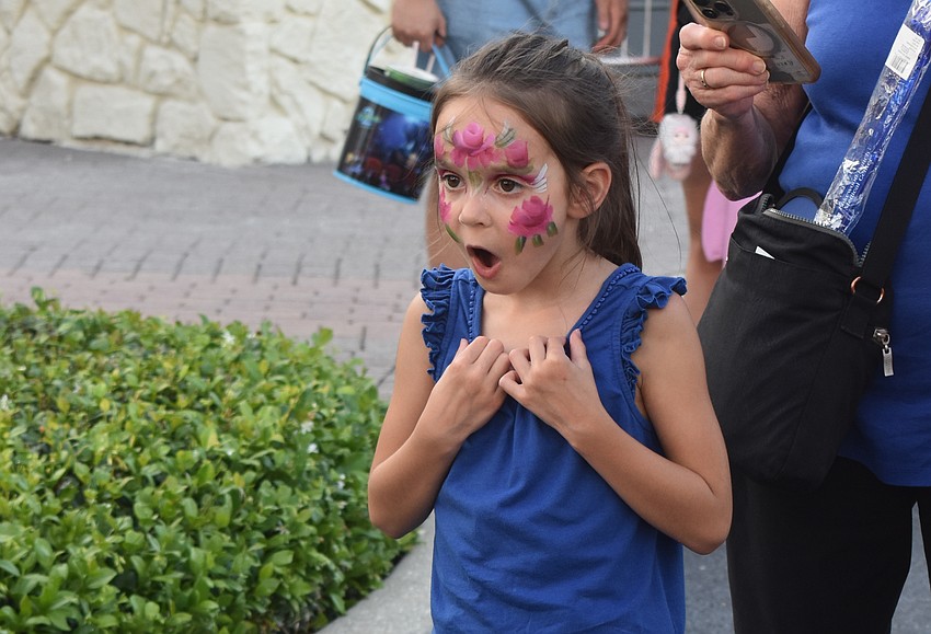Nokomis's Adelyn Stanoev, 7, doesn't hide her excitement when she sets her eyes on a real life boa constrictor.